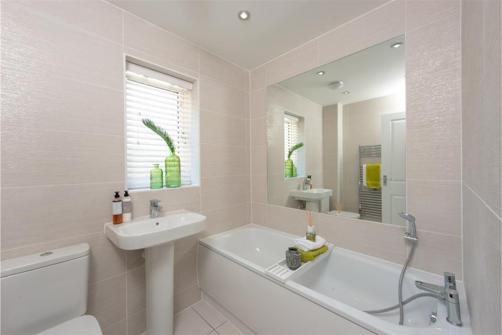 Family bathroom with window to the front
