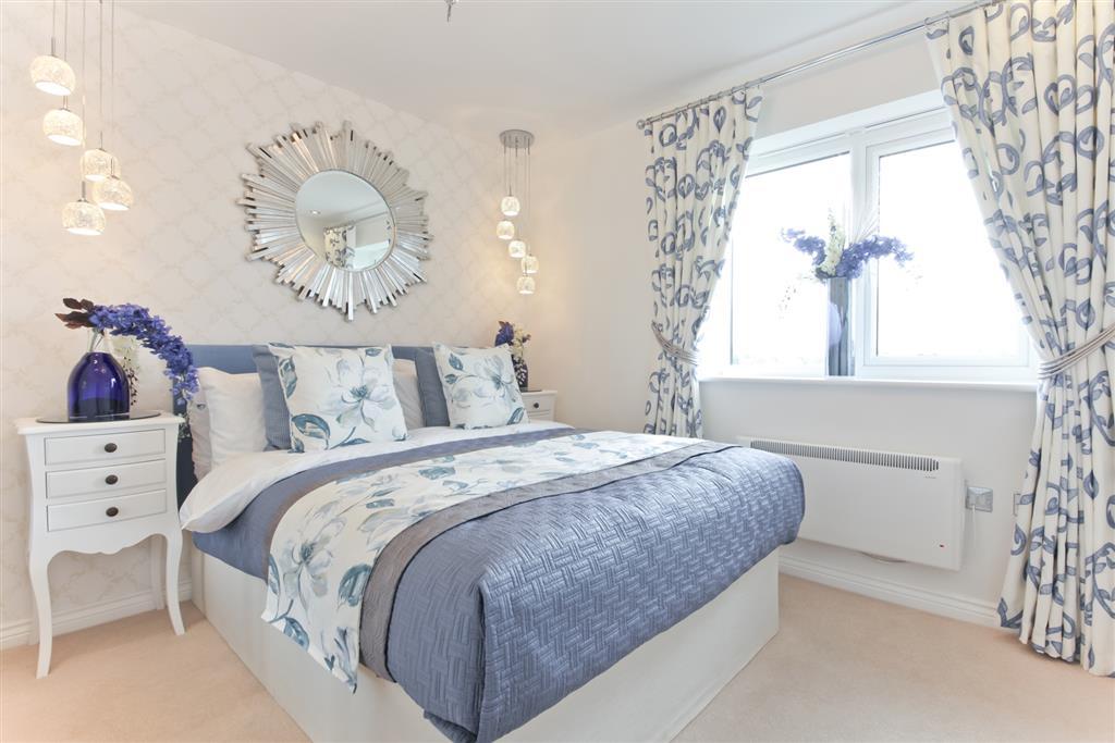 The main bedroom features an en suite