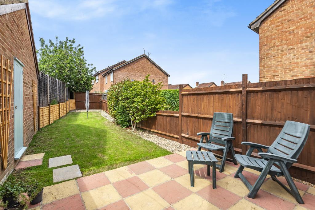 Patio and access to garage from garden
