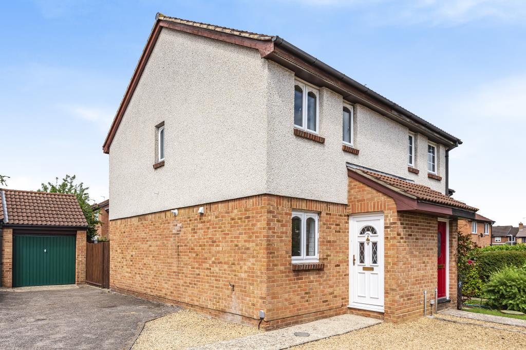 External showing garage and parking