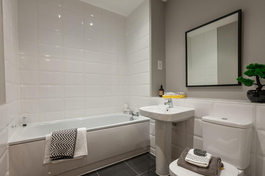 A spacious bathroom completes the home