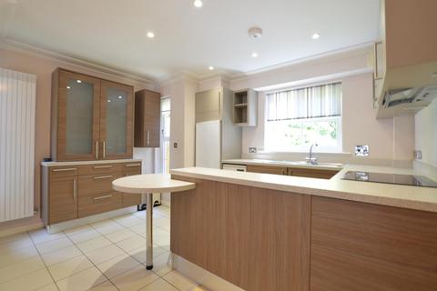 Flat 1, Woodlands House, 89 Old Woking Road, West Byfleet, KT14 6HZ