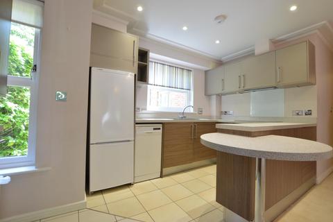 Flat 1, Woodlands House, 89 Old Woking Road, West Byfleet, KT14 6HZ