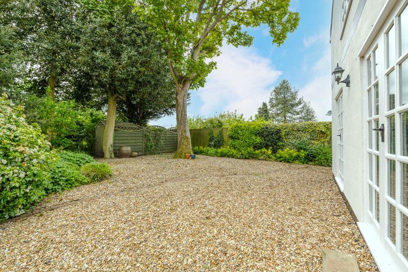Rear gravel patio