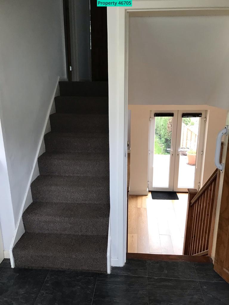 Entrance / stairs to living room / bedrooms