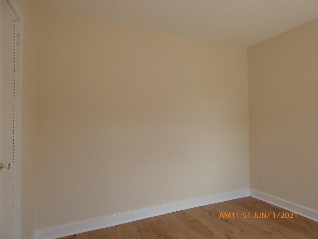 Bedroom (right) walk in cupboard