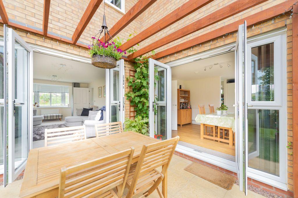 Outdoor seating beneath pergola