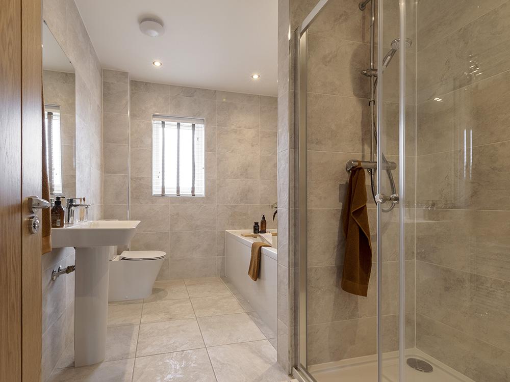 Family bathroom with a separate shower