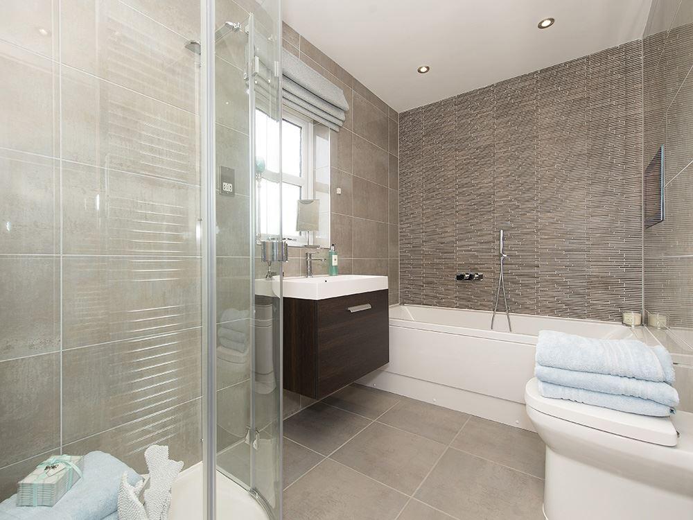 Family bathroom with separate shower cubicle