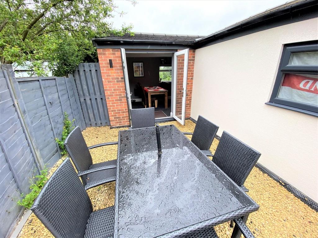 Rear Pebbled Entertainment Area