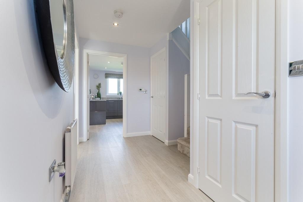 Bright hallway with under stair storage