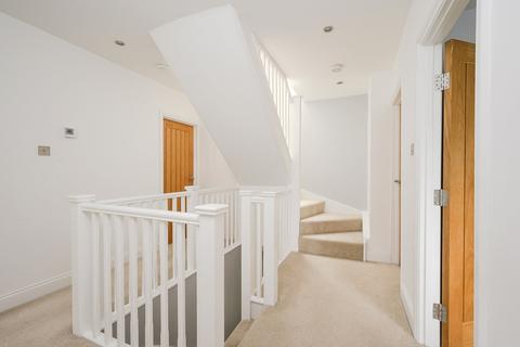 60 Lammas Lane, Esher, KT10 8PD