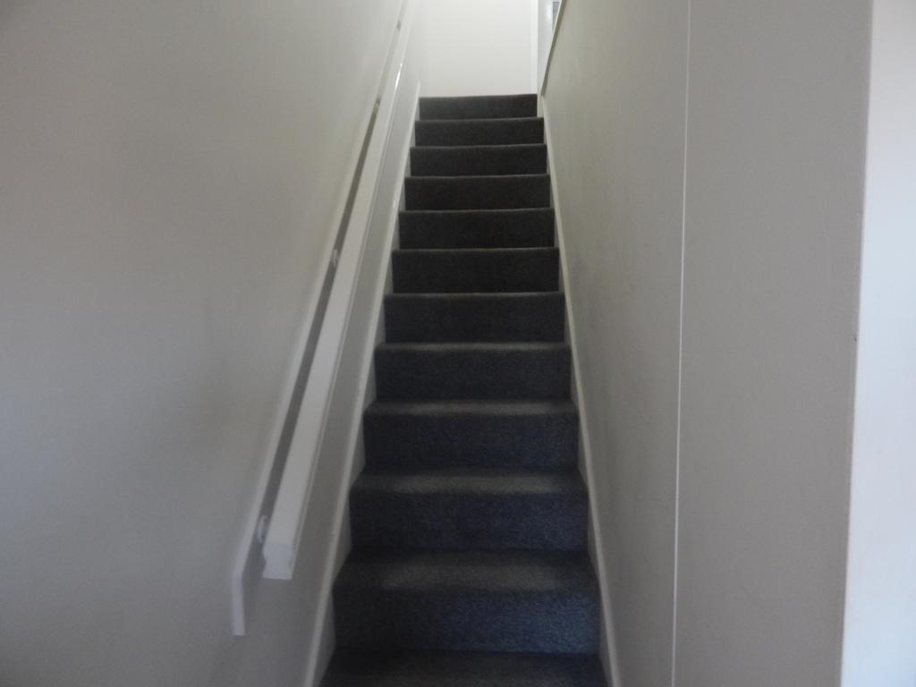 Stairs leading to first floor