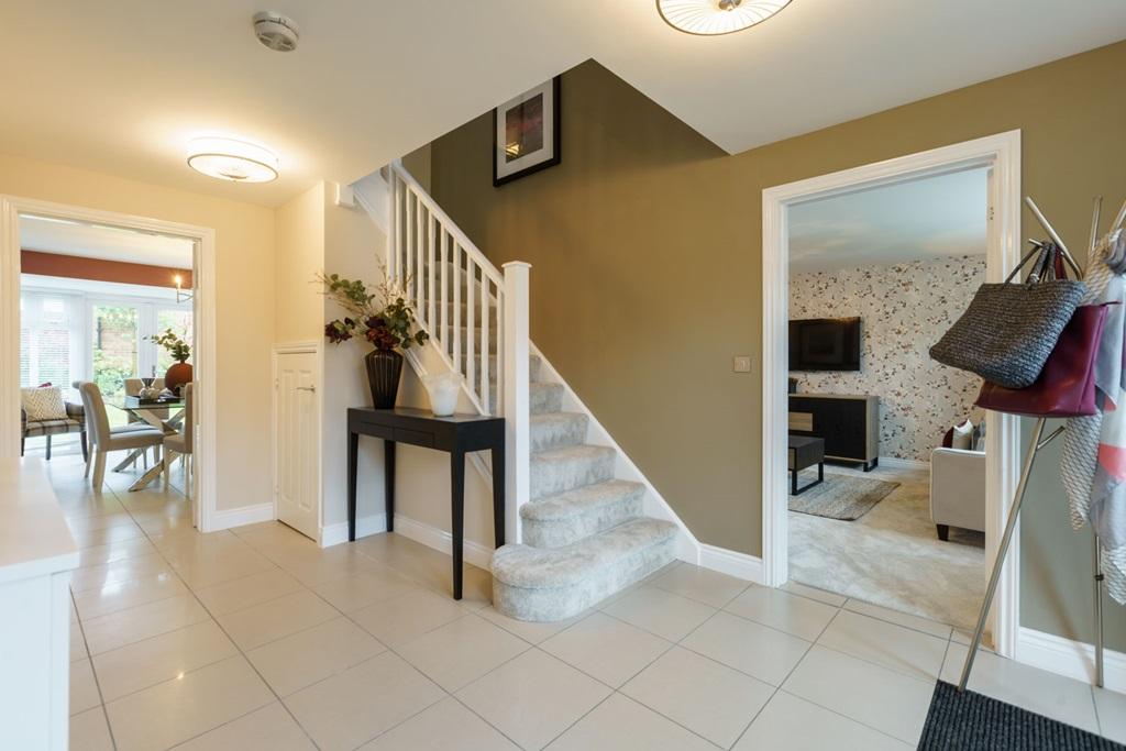 A spacious central hallway with storage