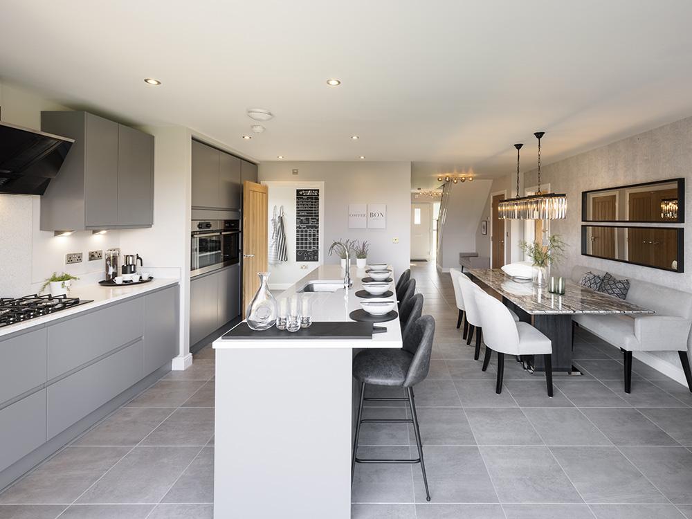 Fully integrated kitchen with open plan dining room