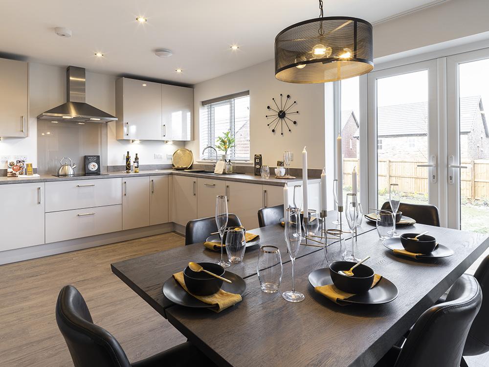 Kitchen/dining/family area with French doors to the garden