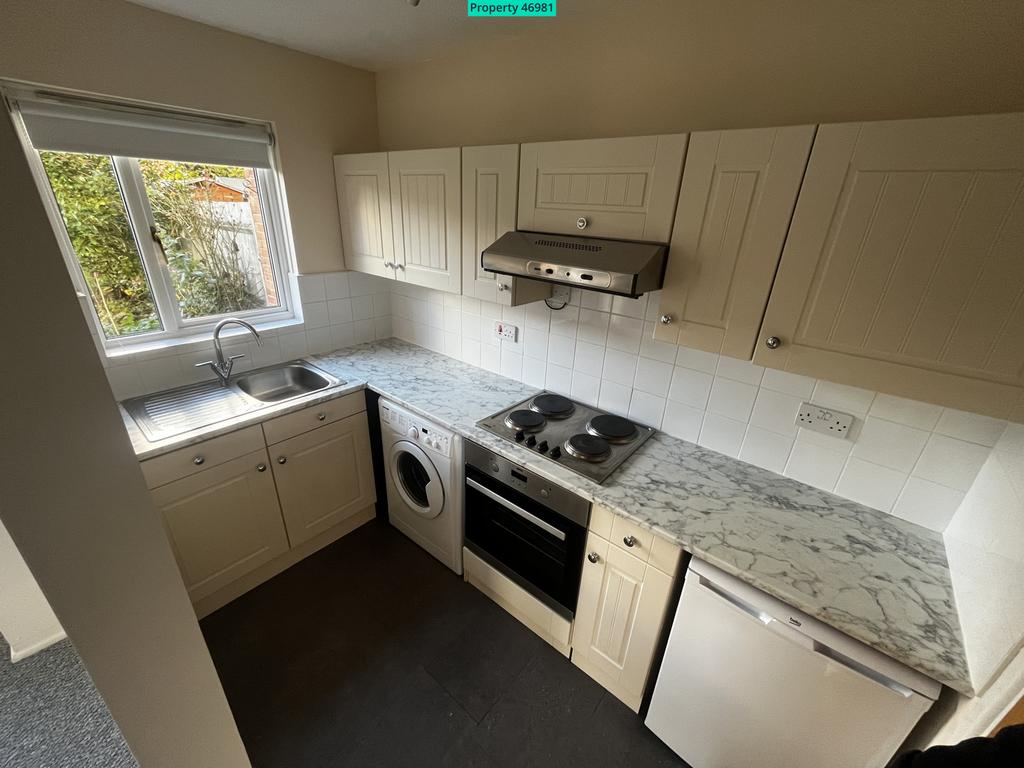 Kitchen with large Larder cupboard