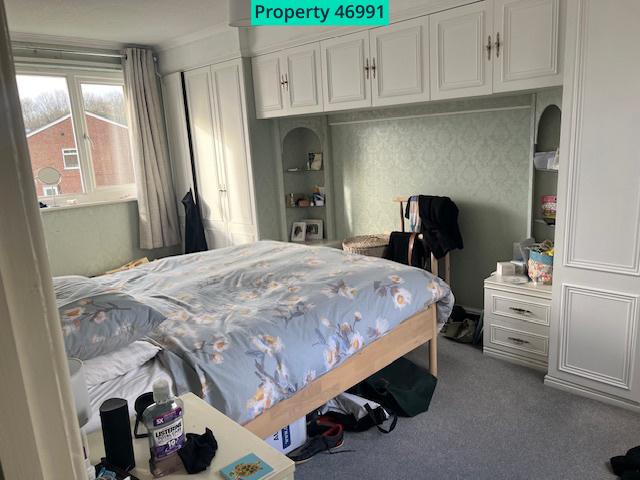 Double bedroom shown with 6ft bed and built in war