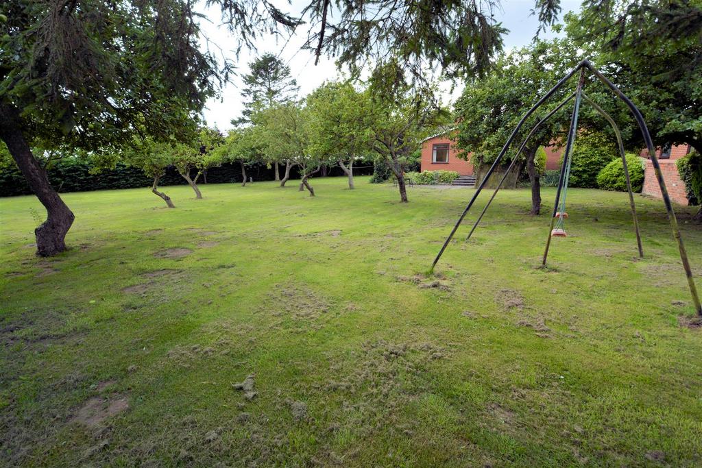 Lodge Farm Bungalow Outside   rear and orchard