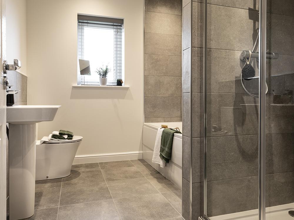 Family bathroom with separate shower