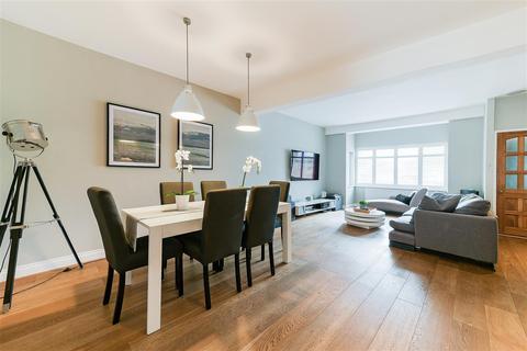 12 Quicks Road, London, SW19 1EZ