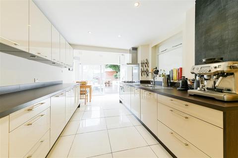 12 Quicks Road, London, SW19 1EZ