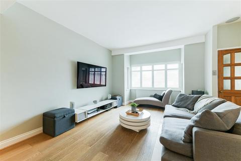 12 Quicks Road, London, SW19 1EZ