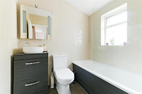12 Quicks Road, London, SW19 1EZ