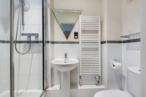 Flat 11, Woodlands House, 89 Old Woking Road, West Byfleet, KT14 6HZ