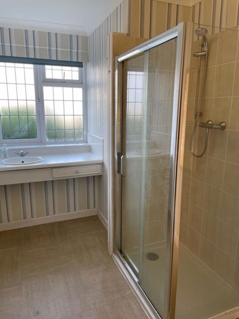 Cubicle shower...