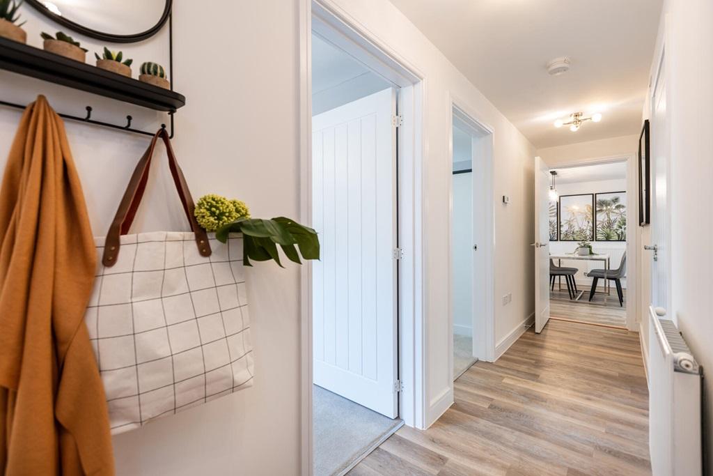 This apartment has a separate hallway with ample storage space