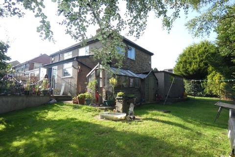 24 Raeburn Drive, Bradford, BD6 2LL