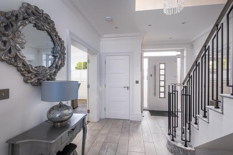 Tembani Pembroke Road, Woking, GU22 7DP