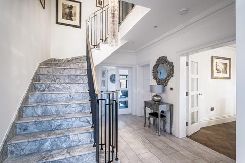 Tembani Pembroke Road, Woking, GU22 7DP