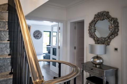 Tembani Pembroke Road, Woking, GU22 7DP