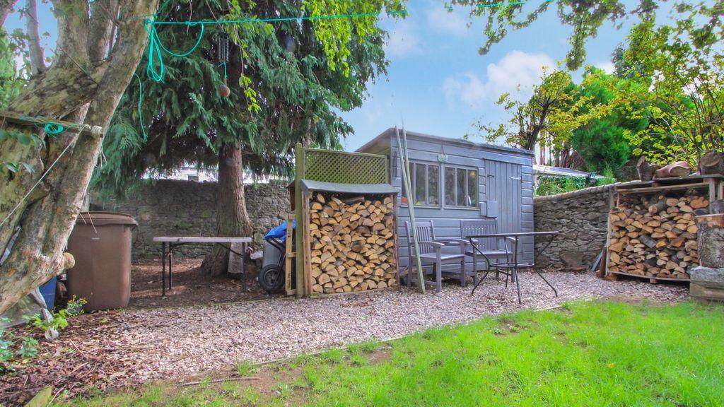 Log store and garden shed.
