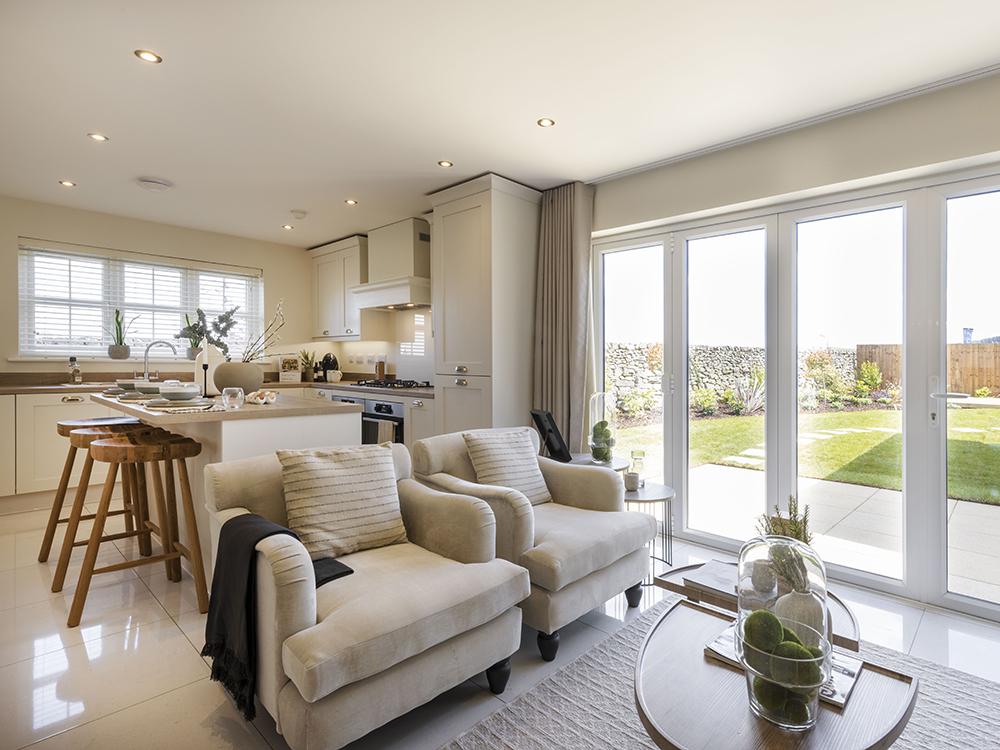 Open plan kitchen/family/dining area with bi fold doors
