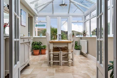 Downland House Beach Road, Woolacombe, EX34 7BT