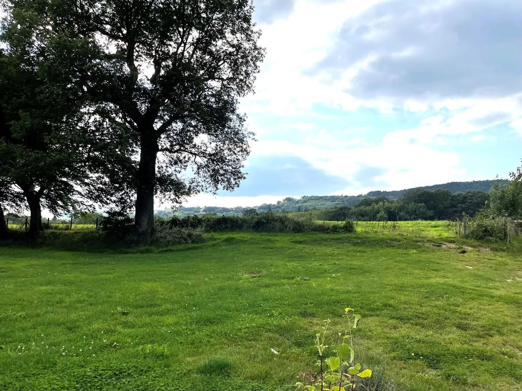 Views across fields to rear