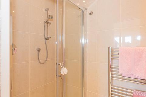 37 Fiddicroft Avenue, Banstead, SM7 3AD