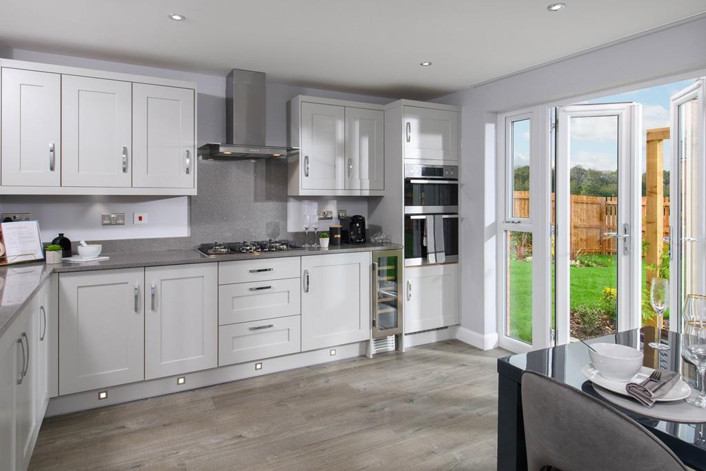 Open plan kitchen diner with French doors at the Halton