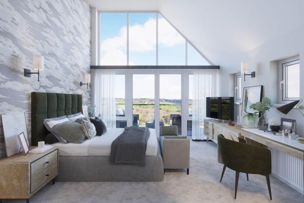 The main bedroom offers spectacular views over local countryside