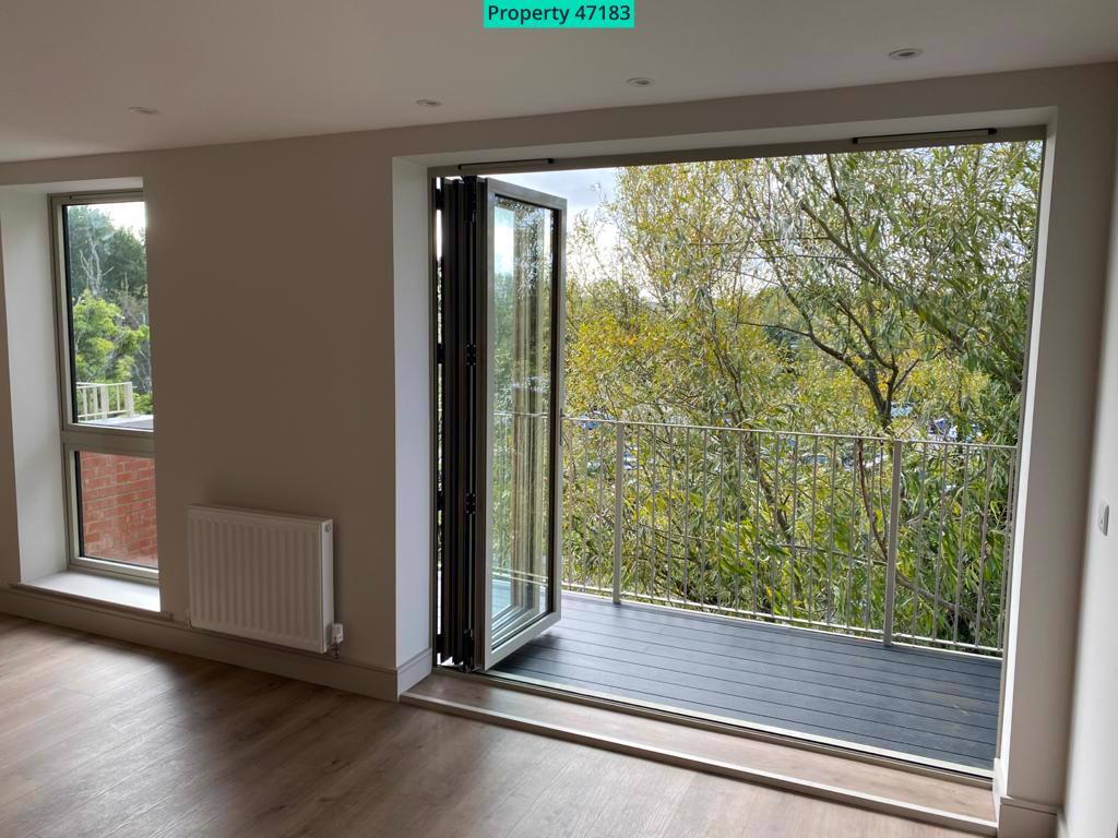 Bi fold doors from living space to balcony