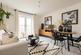 The living area features double doors opening onto a balcony or patio
