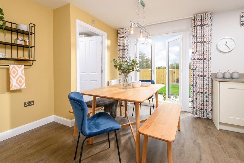 Dining area with French doors in the Abbeydale 3 bedroom Show Home