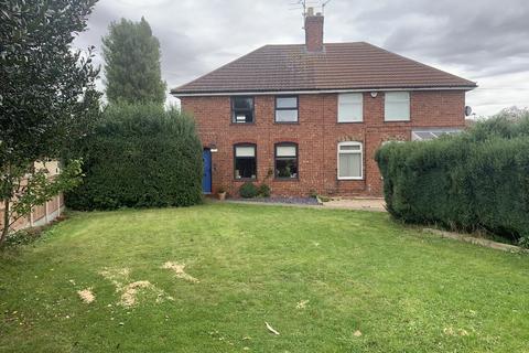 11 Grantham Road, Great Gonerby, Grantham, NG31 8JZ