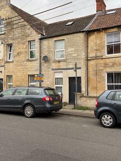 A three bedroom unfurnished terrace house a short walk to the Town Centre and Train Station, Wiltshire