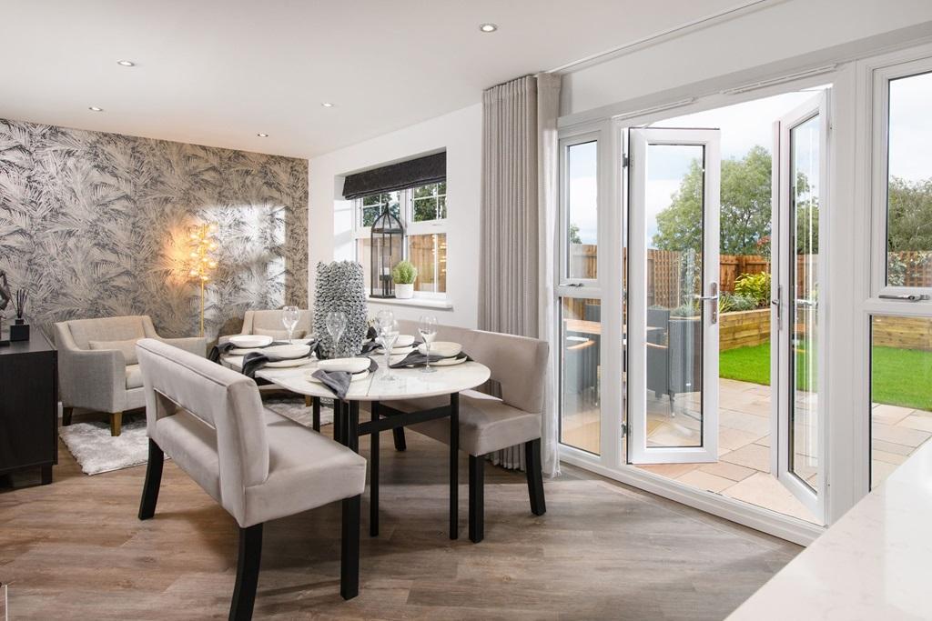 The Radleigh - Open-plan kitchen/dining area with French doors onto garden