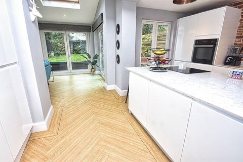 53 Merland Rise, Epsom, KT18 5RN