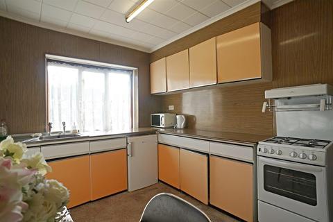 21 New Road, London, E4 9EU